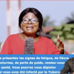 still shot of female tv host in DRC during a quiz show with a signer in the lower right hand corner